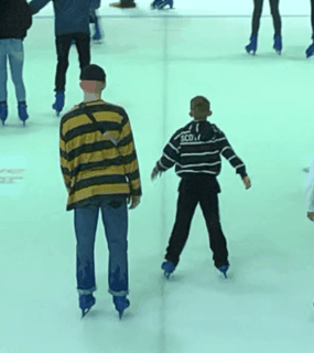 My eldest son steadying my youngest son on the ice rink, when he was about to fall.